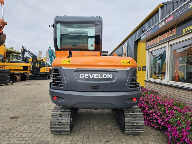 2024 Develon DX60E-10N mini excavator, rear view