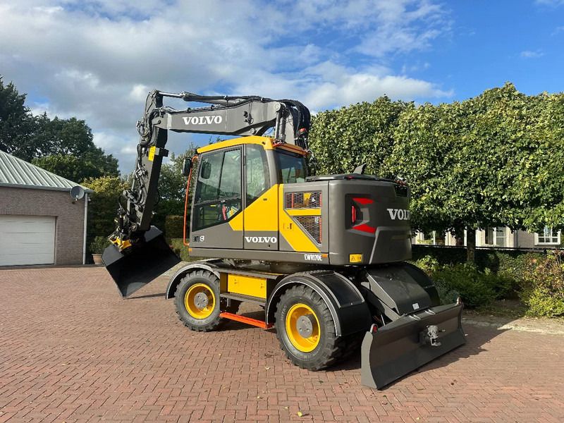 2025 Volvo EWR170E wheel excavator, rear three-quarter view