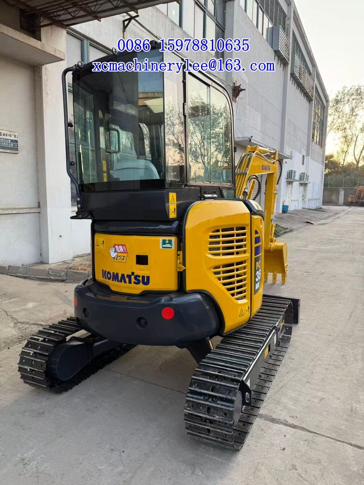 2024 Komatsu PC35 mini excavator, rear three-quarter view 2024 Komatsu PC35 mini excavator, rear three-quarter view