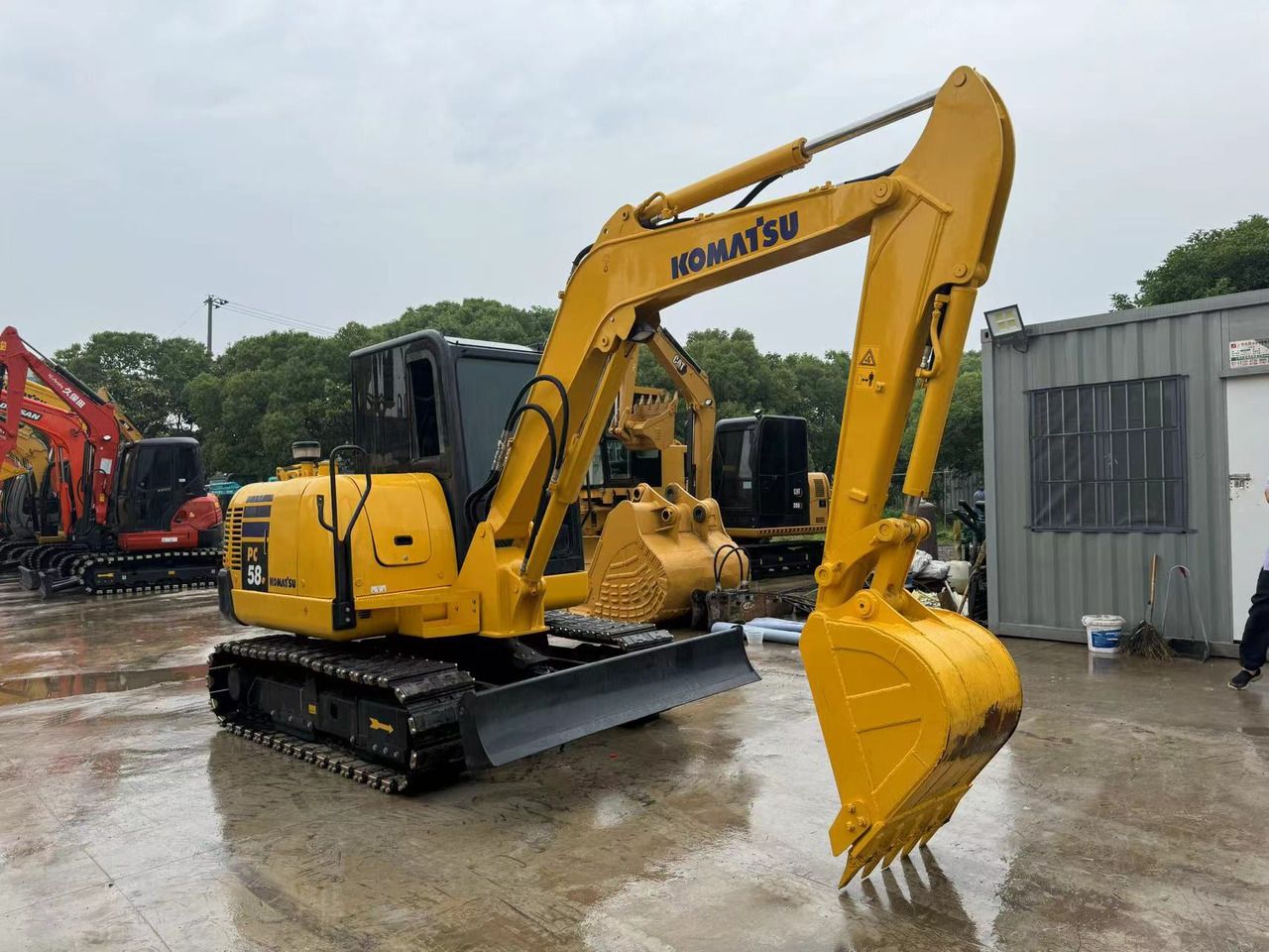 2022 Komatsu PC58 crawler excavator, front three-quarter view