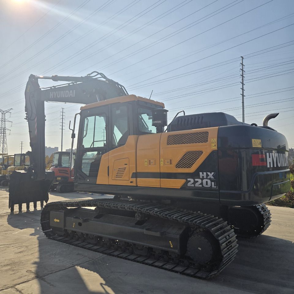 2026 Hyundai HX220L crawler excavator, rear three-quarter view