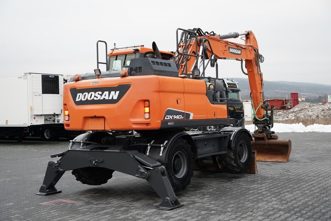 2019 Doosan DX140W Pelle sur roues