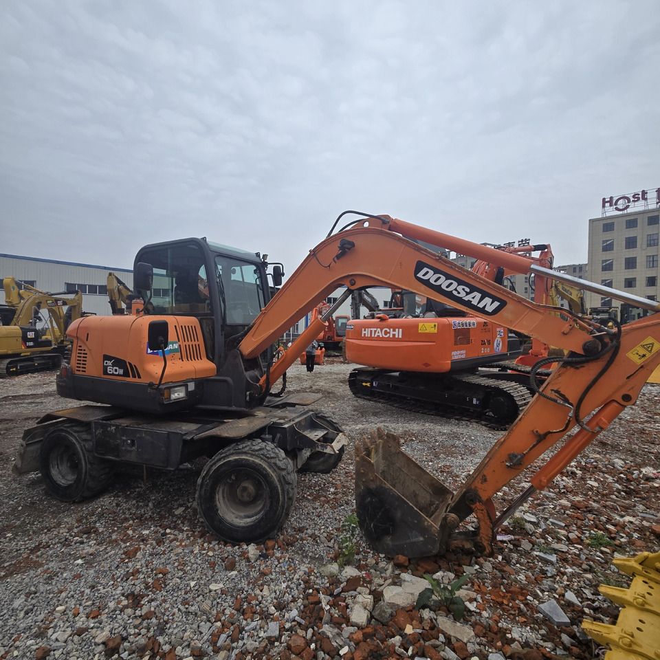 2018 Doosan DX60W wheel excavator, side view 2018 Doosan DX60W wheel excavator, side view