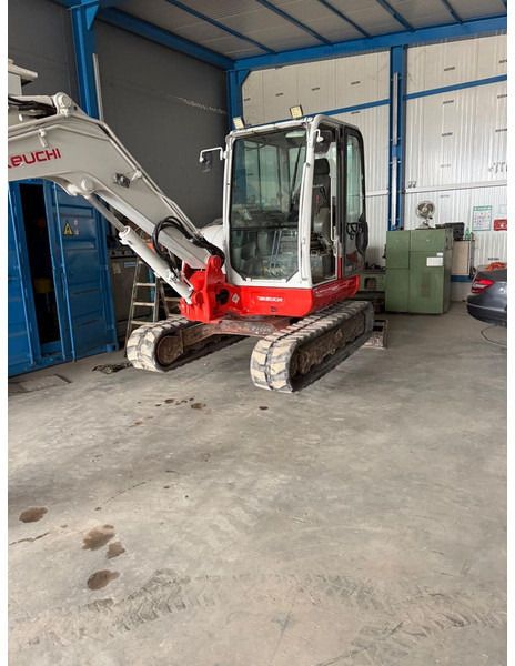 2016 Takeuchi TB260 mini excavator, front three-quarter view