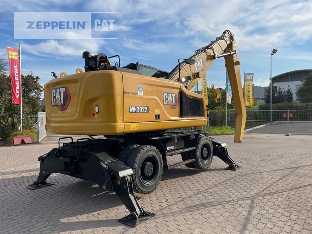 2021 Caterpillar MH3022 material handler, rear three-quarter view