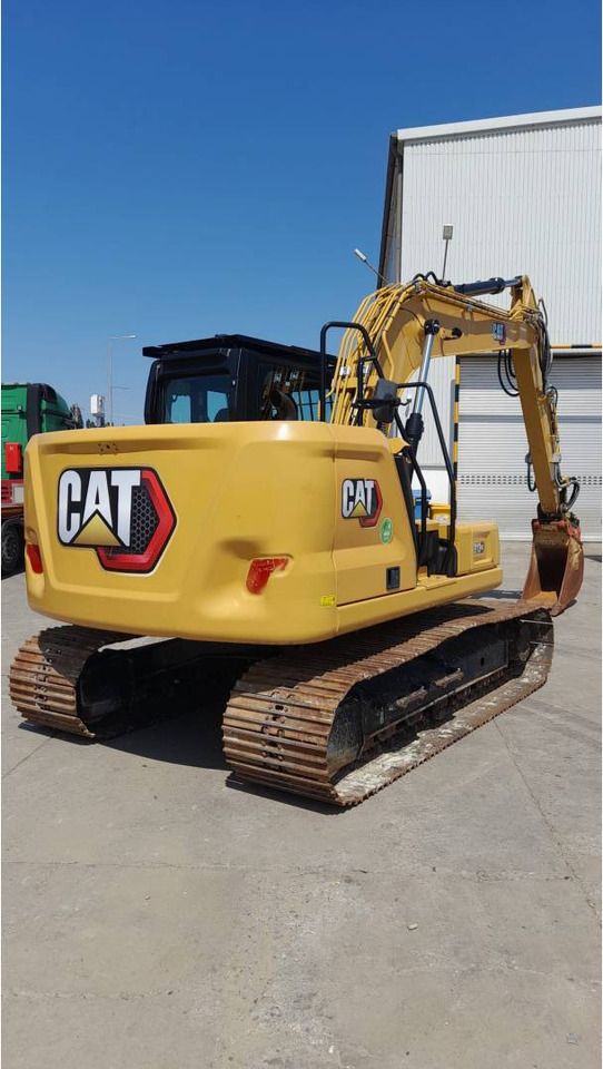 2021 Caterpillar 313-07GC crawler excavator, rear three-quarter view 2021 Caterpillar 313-07GC crawler excavator, rear three-quarter view