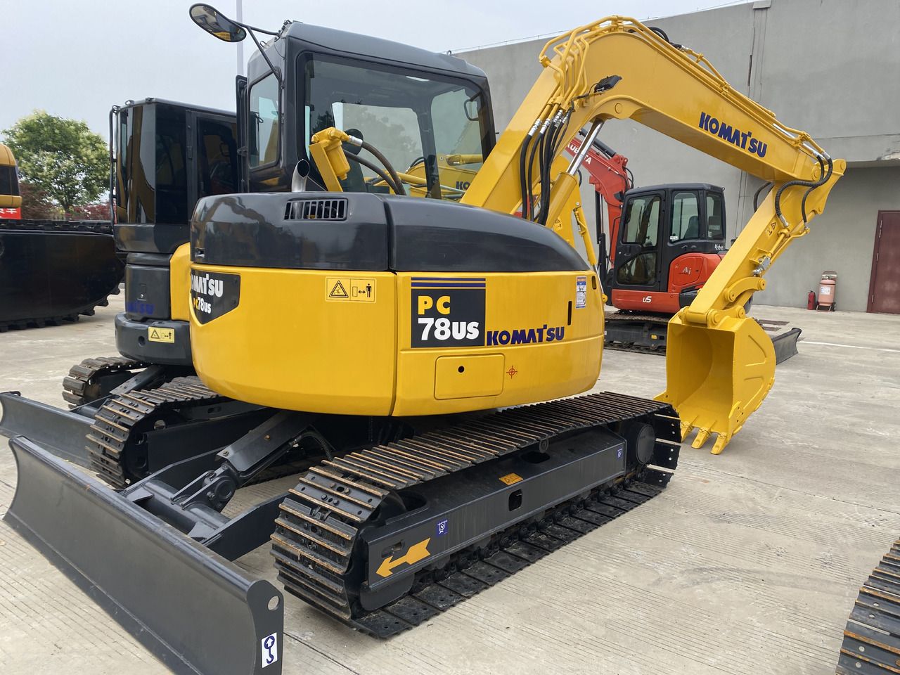 2022 Komatsu PC78US mini excavator, rear three-quarter view 2022 Komatsu PC78US mini excavator, rear three-quarter view
