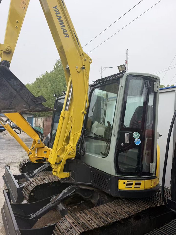 2024 Yanmar ViO55 mini excavator, side view 2024 Yanmar ViO55 mini excavator, side view