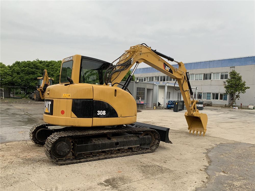 CAT 308D crawler excavator, side view CAT 308D crawler excavator, side view