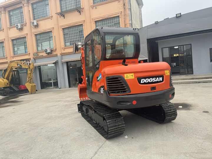 2018 Doosan DX60 crawler excavator rear three-quarter view 2018 Doosan DX60 crawler excavator rear three-quarter view