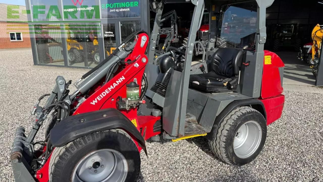 2022 Weidemann 1260 LP mini excavator, side view 2022 Weidemann 1260 LP mini excavator, side view