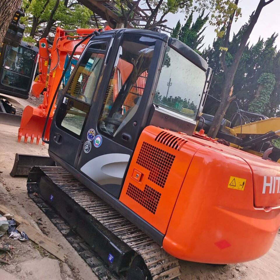 2024 Hitachi ZX60 mini excavator, rear three-quarter view 2024 Hitachi ZX60 mini excavator, rear three-quarter view