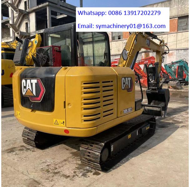 2023 Caterpillar 305.5E2 mini excavator, rear three-quarter view