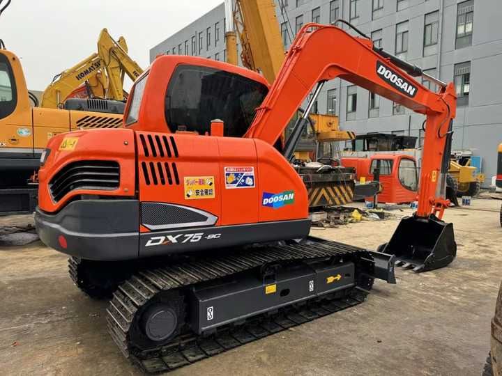 2022 Doosan DX75-9C crawler excavator, rear three-quarter view 2022 Doosan DX75-9C crawler excavator, rear three-quarter view