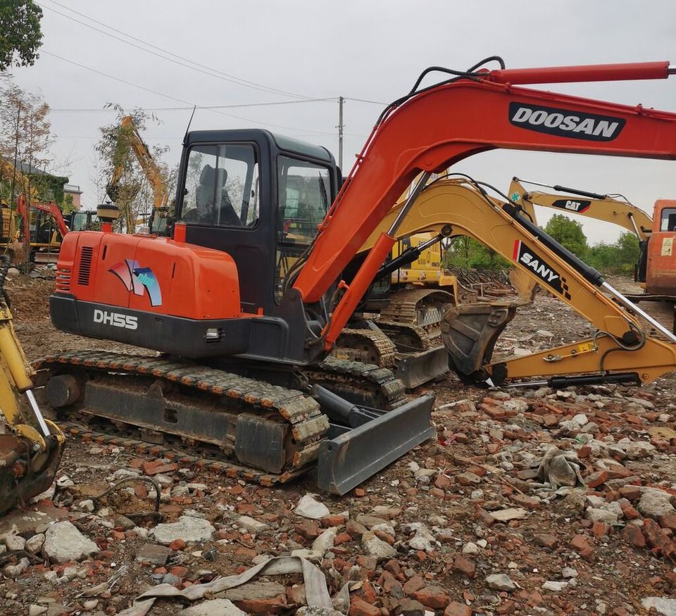 Doosan DH55 crawler excavator, side view Doosan DH55 crawler excavator, side view