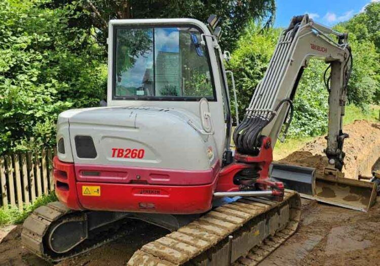 2018 Takeuchi TB260 mini excavator, rear three-quarter view 2018 Takeuchi TB260 mini excavator, rear three-quarter view