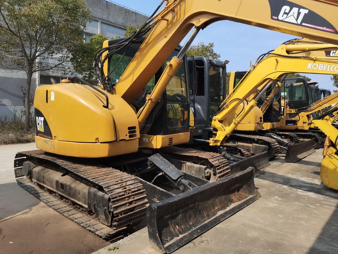 2011 Caterpillar 308C mini excavator, rear three-quarter view