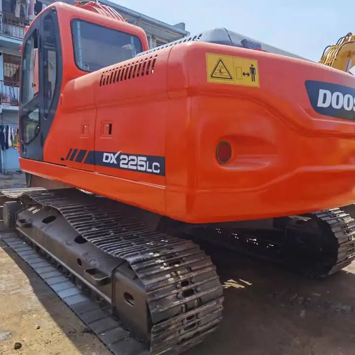 2021 Doosan DX225LC crawler excavator rear three-quarter view 2021 Doosan DX225LC crawler excavator rear three-quarter view