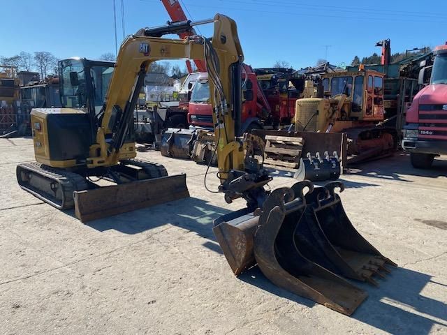 2023 Caterpillar 305C mini excavator, front three-quarter view