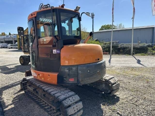 2016 Komatsu PC80MR-3 mini excavator, rear three-quarter view