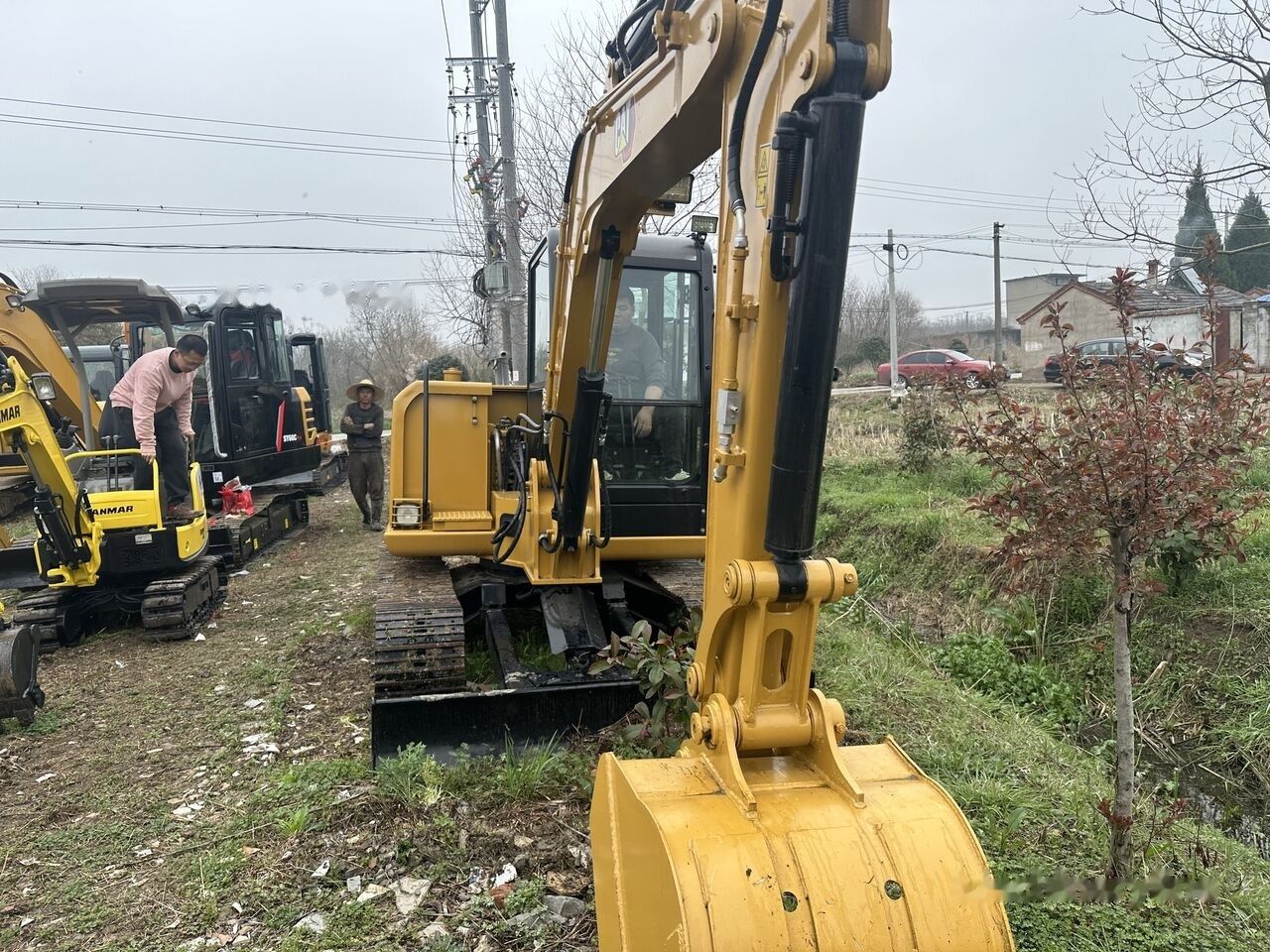 Caterpillar 306 Mini Excavator, front three-quarter view