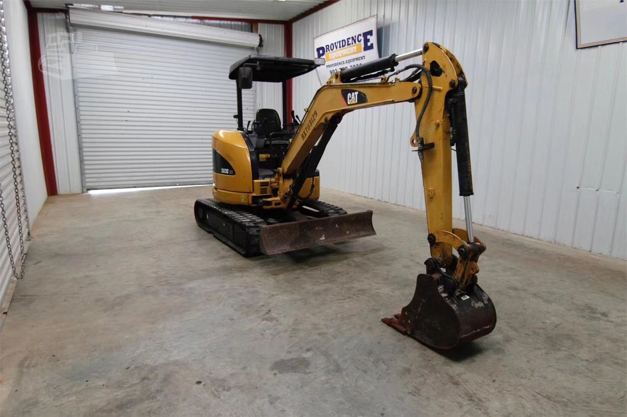 2022 Caterpillar 303C mini excavator, front three-quarter view 2022 Caterpillar 303C mini excavator, front three-quarter view