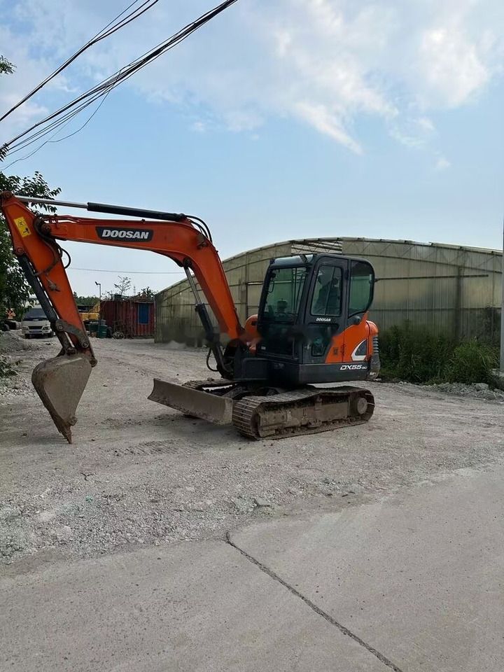 2018 Doosan DX55 mini excavator, side view 2018 Doosan DX55 mini excavator, side view