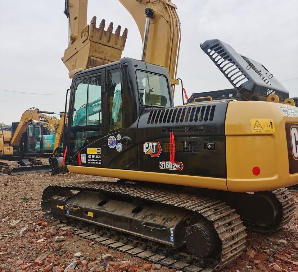 Caterpillar 315D2GC crawler excavator, side view Caterpillar 315D2GC crawler excavator, side view