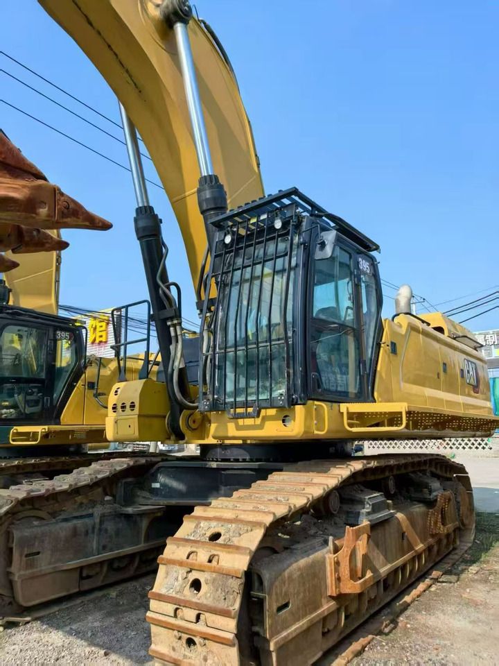 2022 Caterpillar 395 crawler excavator, side view 2022 Caterpillar 395 crawler excavator, side view