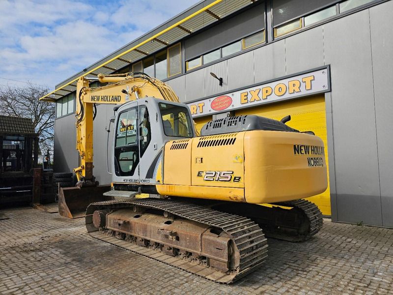 2008 New Holland E215B crawler excavator, rear three-quarter view 2008 New Holland E215B crawler excavator, rear three-quarter view