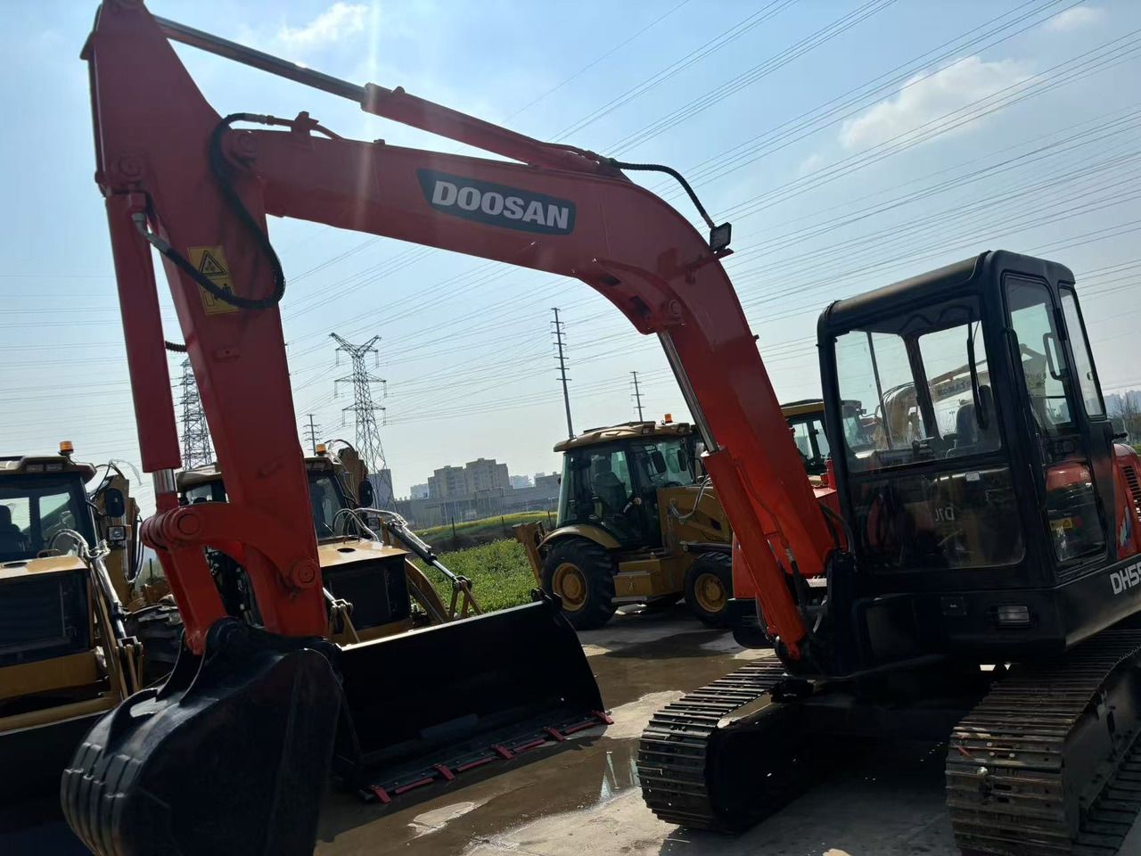 2020 Doosan DH55 mini excavator, side view 2020 Doosan DH55 mini excavator, side view
