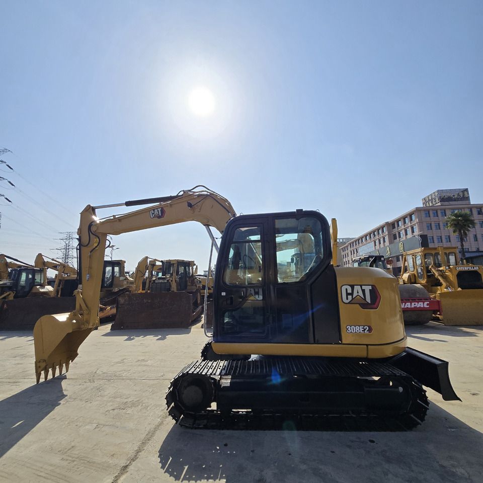2023 Caterpillar 308E2 mini excavator, side profile view