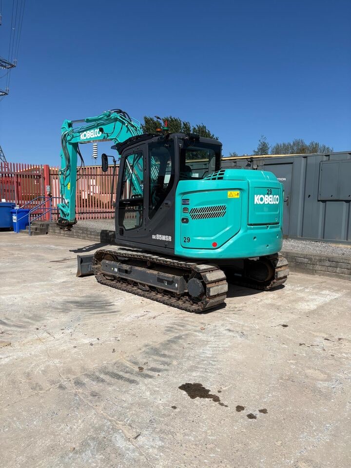 2024 Kobelco SK85MSR-7 DZ mini excavator, rear three-quarter view 2024 Kobelco SK85MSR-7 DZ mini excavator, rear three-quarter view