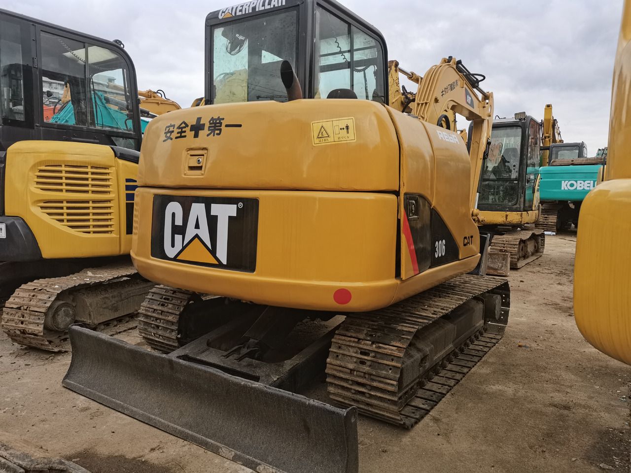 Caterpillar 306 mini excavator, rear view Caterpillar 306 mini excavator, rear view