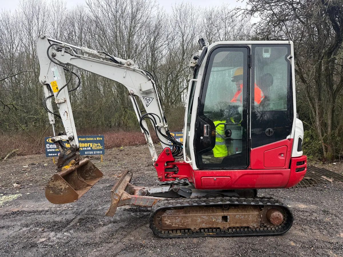 2018 Takeuchi TB230 mini excavator, side view 2018 Takeuchi TB230 mini excavator, side view