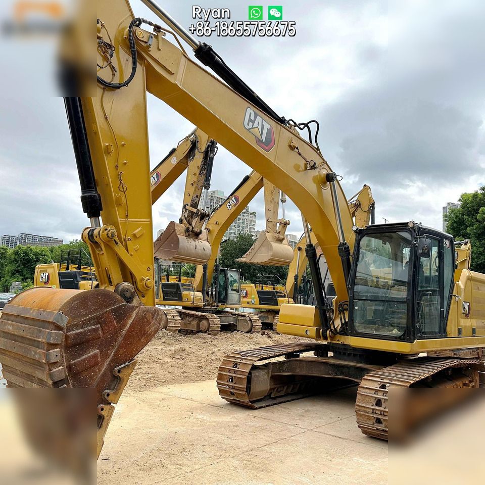 2023 Caterpillar 320 crawler excavator, front three-quarter view