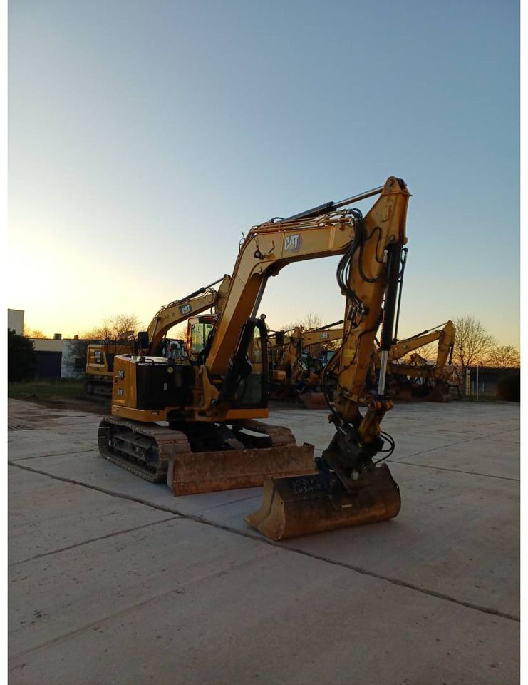 2023 Caterpillar 308 crawler excavator, front three-quarter view 2023 Caterpillar 308 crawler excavator, front three-quarter view