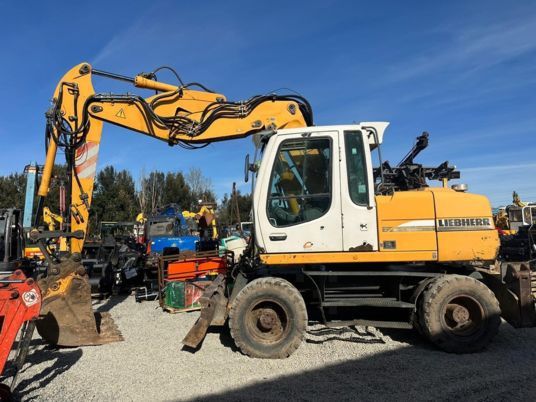 2006 Liebherr A314 Litronic wheel excavator, side view 2006 Liebherr A314 Litronic wheel excavator, side view