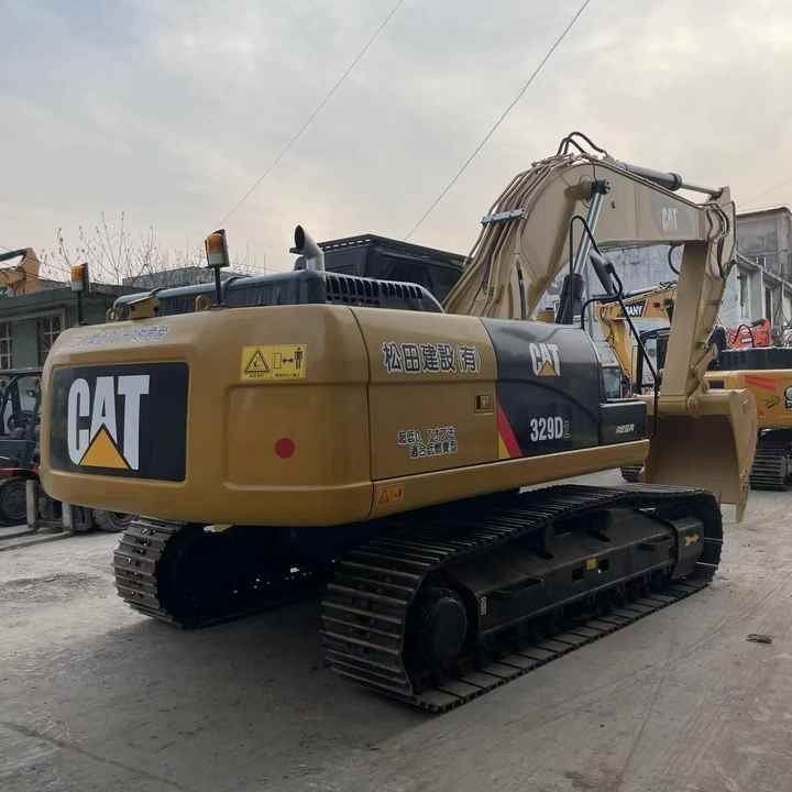 2022 Caterpillar 329D crawler excavator, rear three-quarter view 2022 Caterpillar 329D crawler excavator, rear three-quarter view