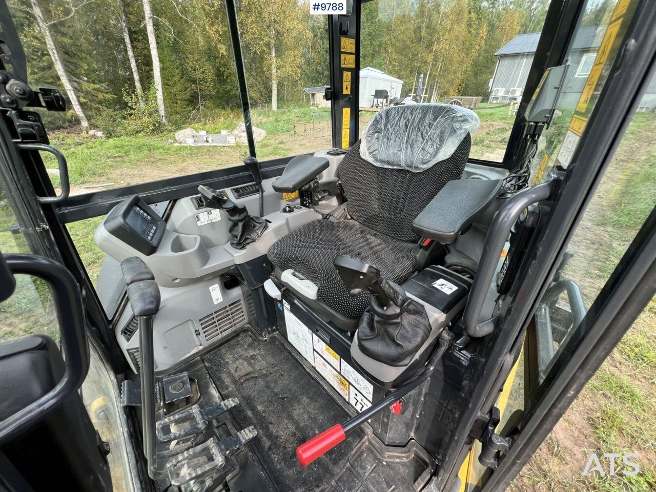 2021 Komatsu PC55MR-5 mini excavator interior view 2021 Komatsu PC55MR-5 mini excavator interior view