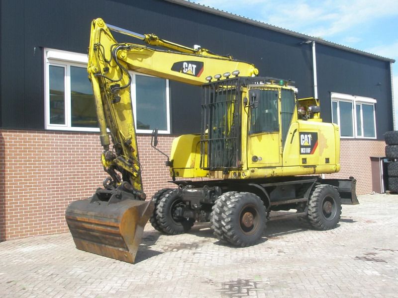 2017 Caterpillar M318F wheel excavator, side profile view 2017 Caterpillar M318F wheel excavator, side profile view