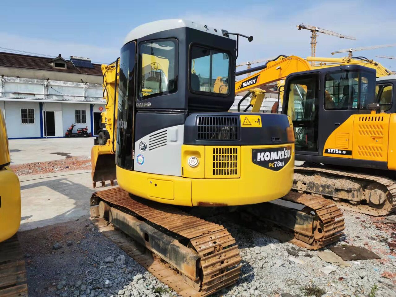 2023 Komatsu PC78US-6 excavator rear three-quarter view 2023 Komatsu PC78US-6 excavator rear three-quarter view