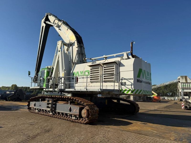 2012 Mantsinen 160 R crawler excavator, rear three-quarter view 2012 Mantsinen 160 R crawler excavator, rear three-quarter view