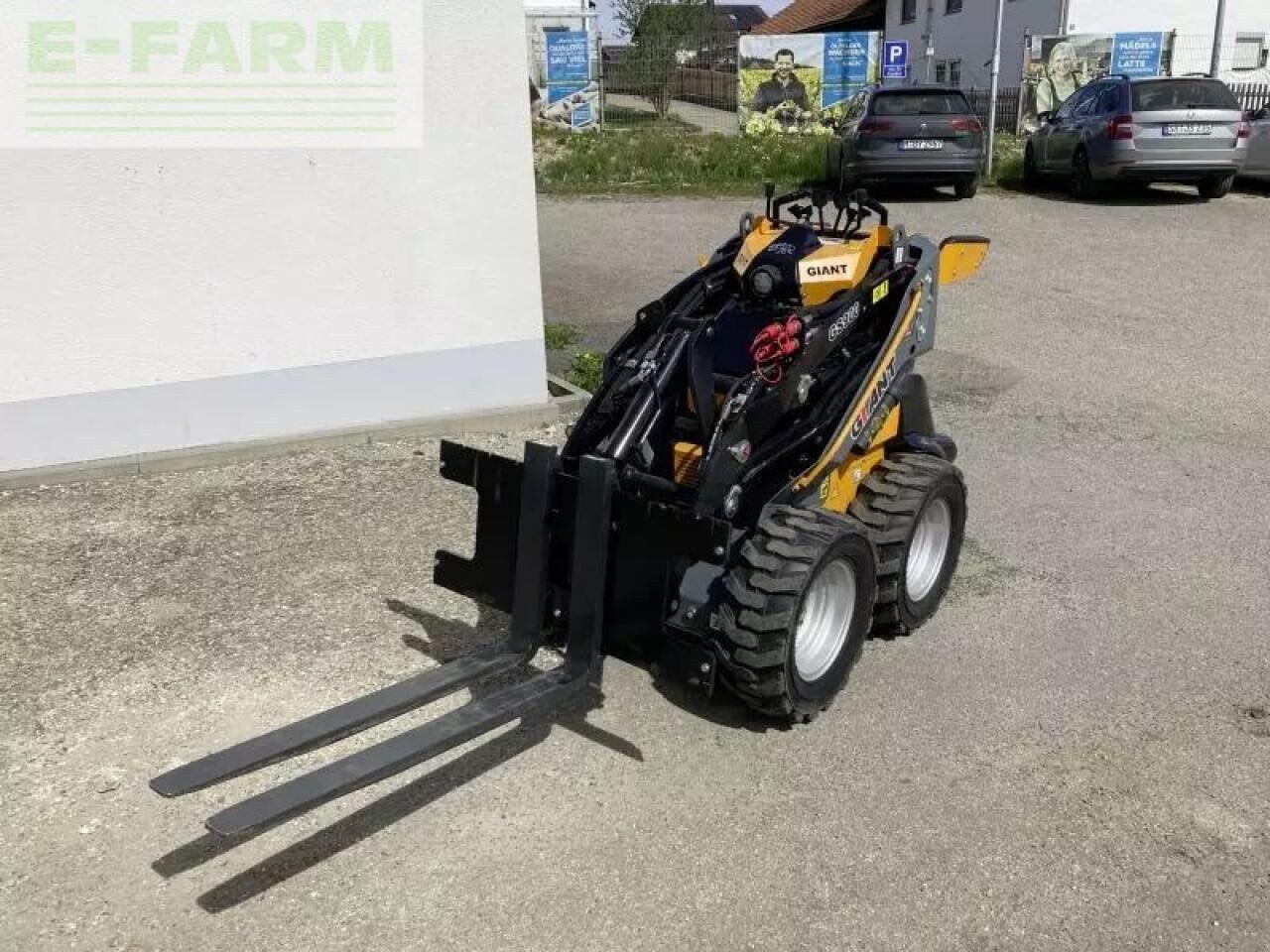 2024 Giant GS900 mini excavator with pallet forks, front three-quarter view