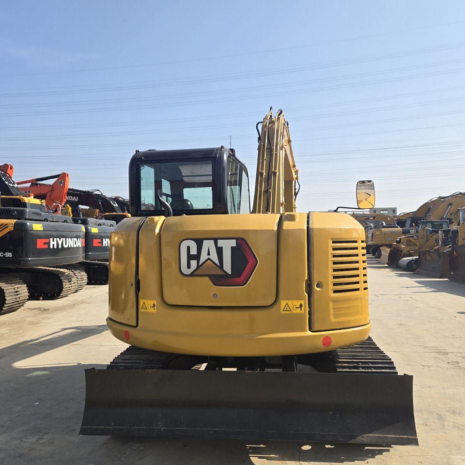 2023 Caterpillar 308E2 mini excavator, rear view