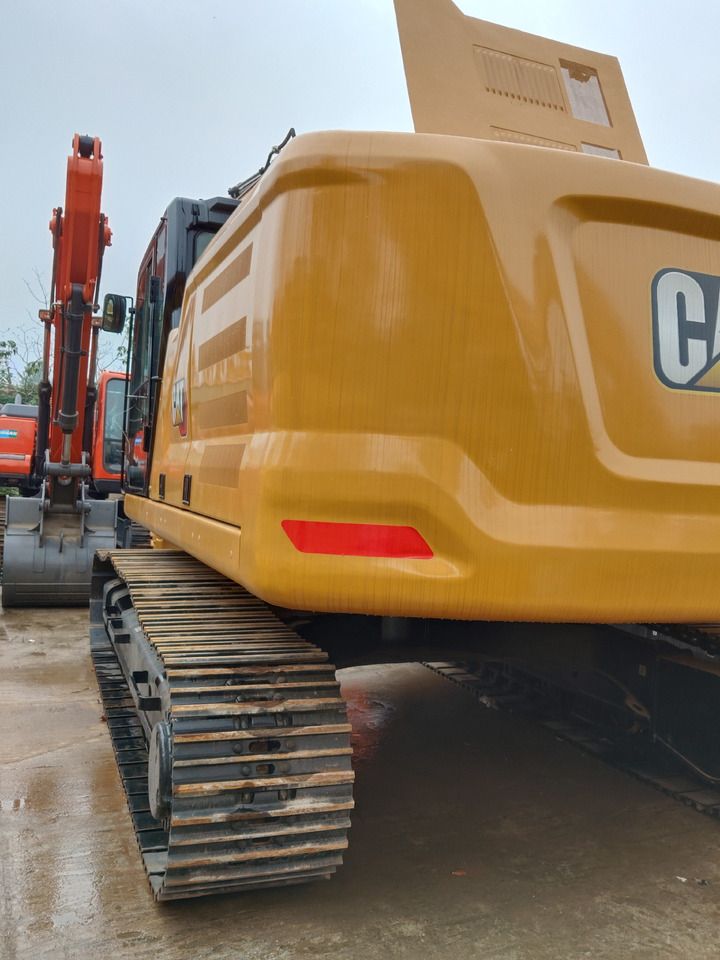 2023 Caterpillar 330GC crawler excavator, rear three-quarter view 2023 Caterpillar 330GC crawler excavator, rear three-quarter view