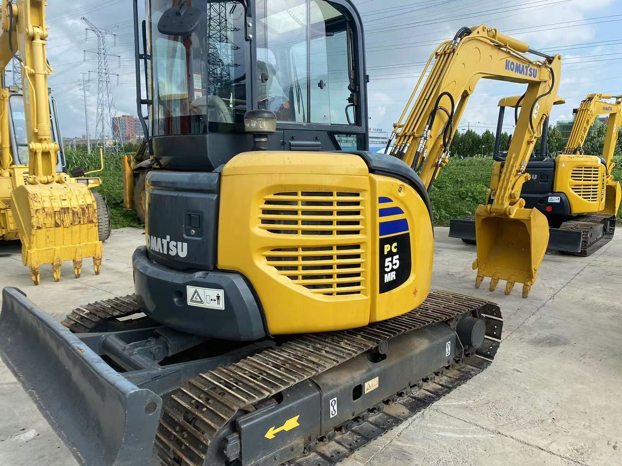 2022 Komatsu PC-55MR mini excavator, rear three-quarter view