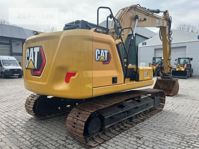 2022 Caterpillar 313-07A crawler excavator, rear three-quarter view 2022 Caterpillar 313-07A crawler excavator, rear three-quarter view