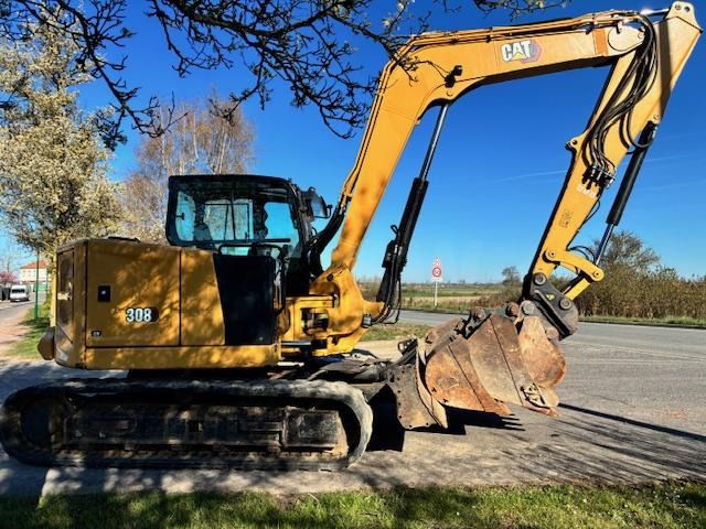 2021 Caterpillar 308 mini excavator side view 2021 Caterpillar 308 mini excavator side view