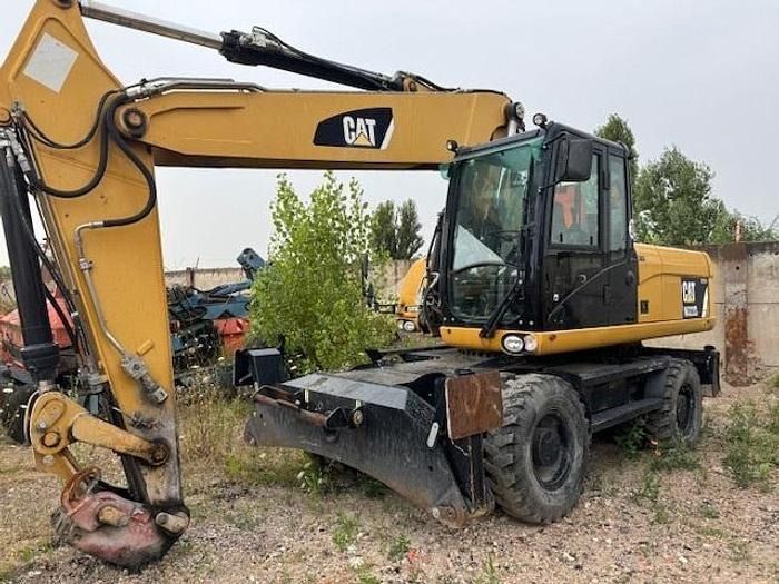 2012 Caterpillar M322D wheel excavator side view